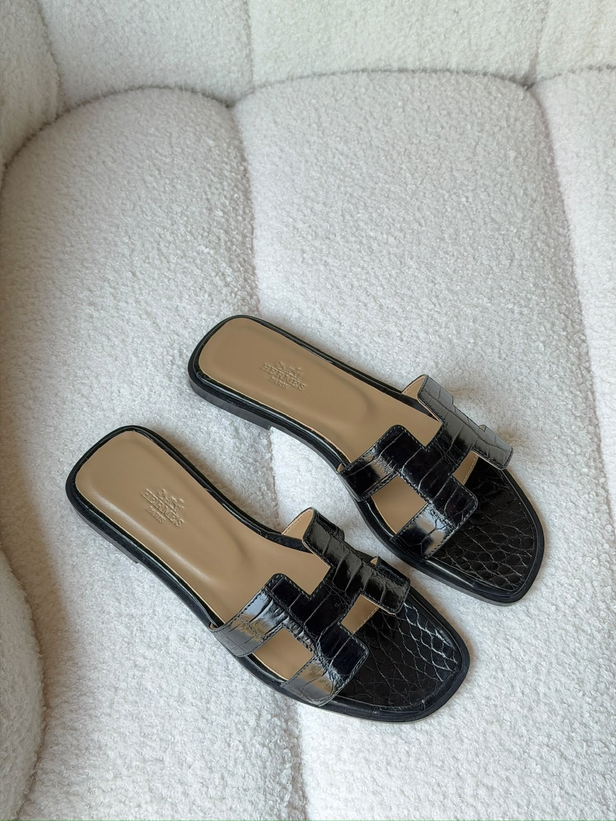 Hermès Oran sandals in crocodile-embossed leather