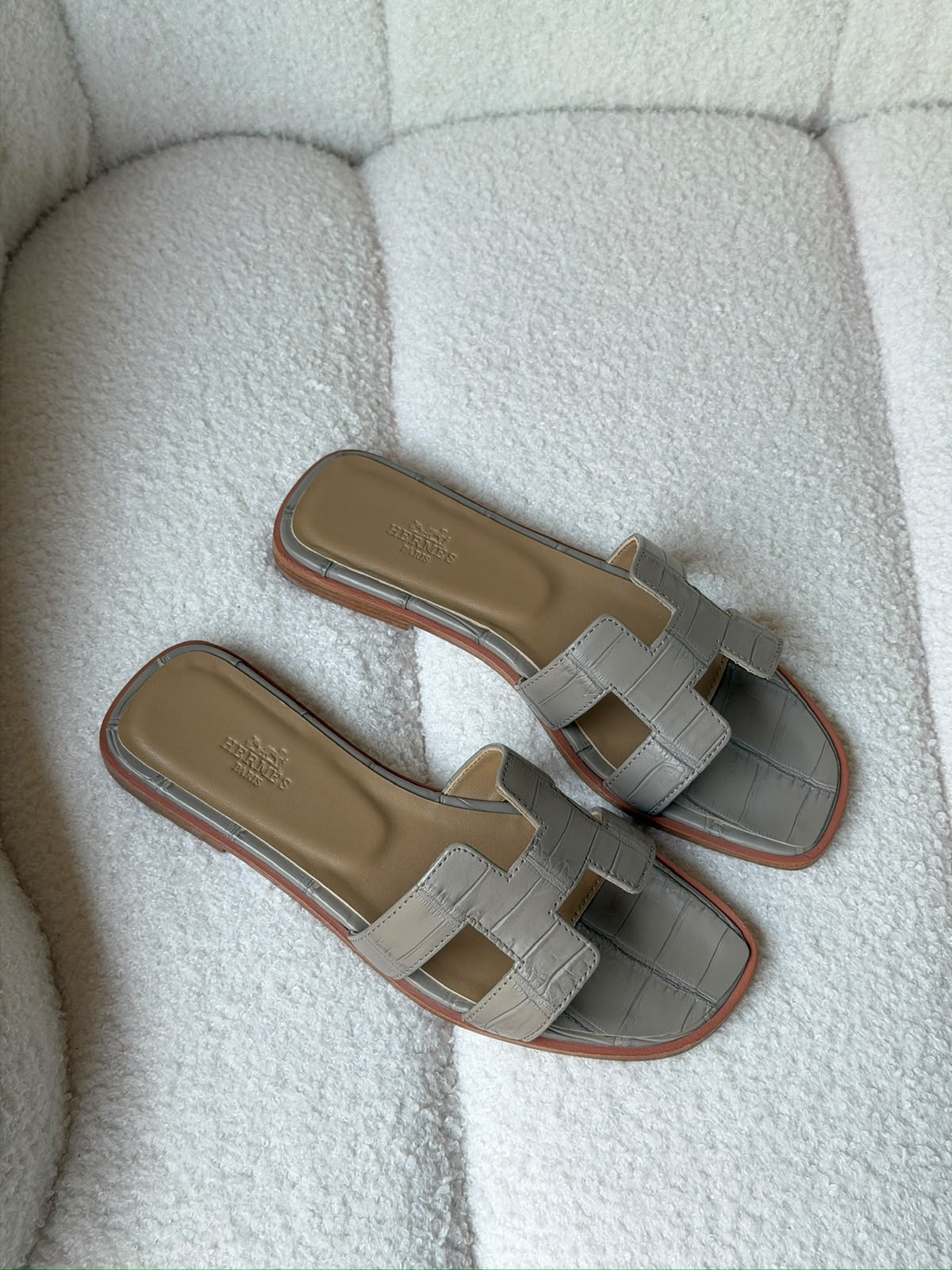 Hermès Oran sandals in crocodile-embossed leather