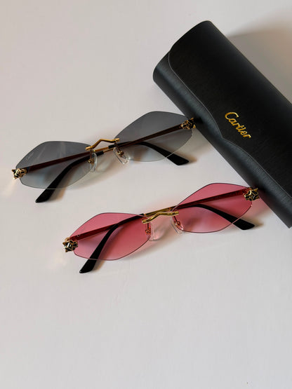 sunglasses are the Cartier Panthère de Cartier Rimless Model CT0433S
