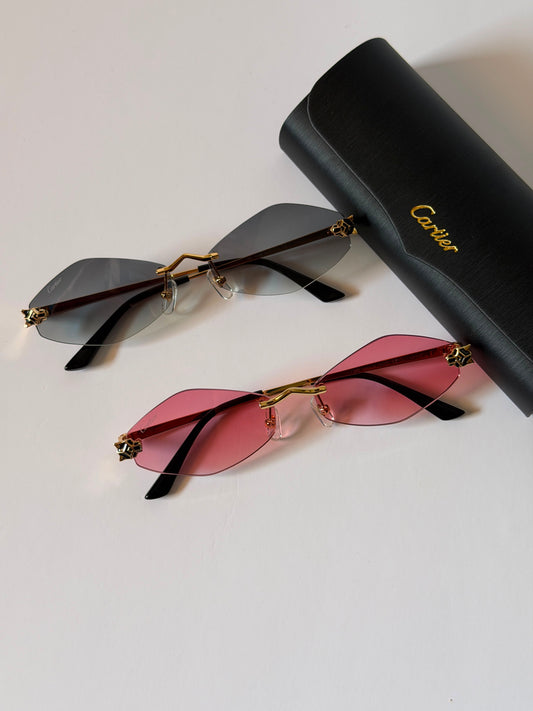 sunglasses are the Cartier Panthère de Cartier Rimless Model CT0433S