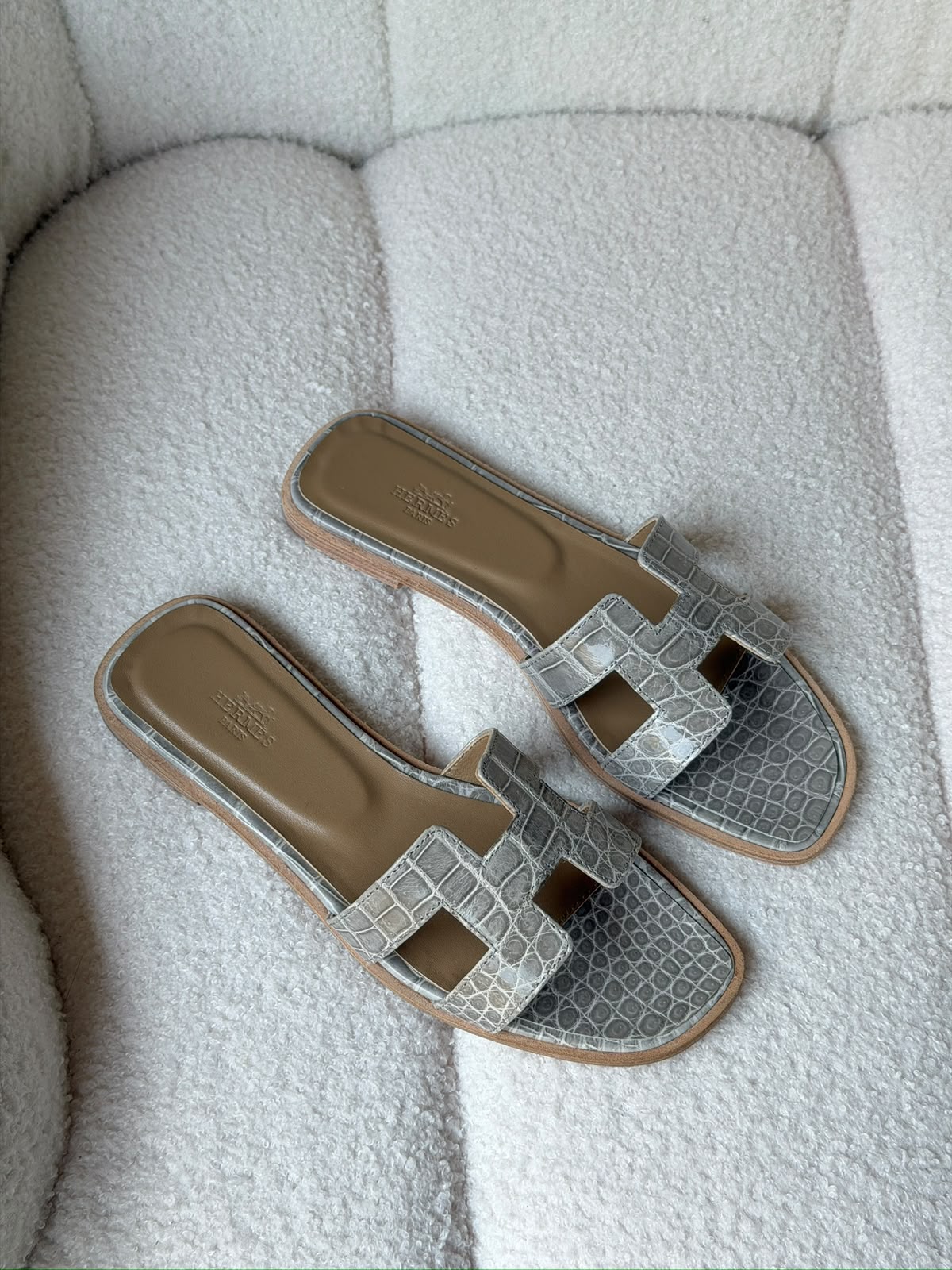 Hermès Oran sandals in crocodile-embossed leather