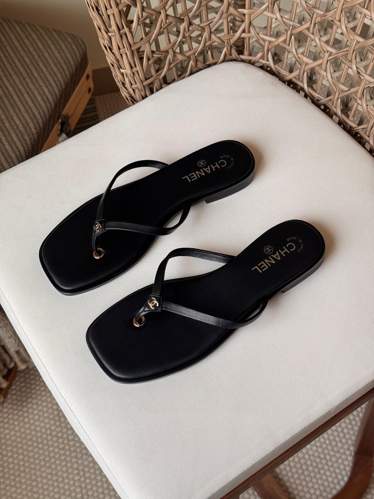 Chanel thong sandals featuring