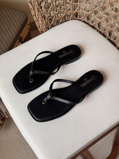 Chanel thong sandals featuring