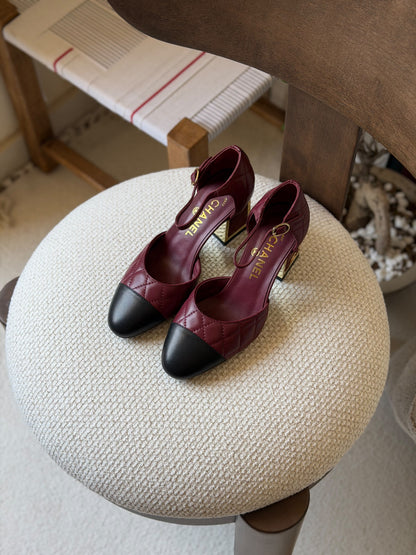 Chanel quilted block-heel Mary Jane pumps