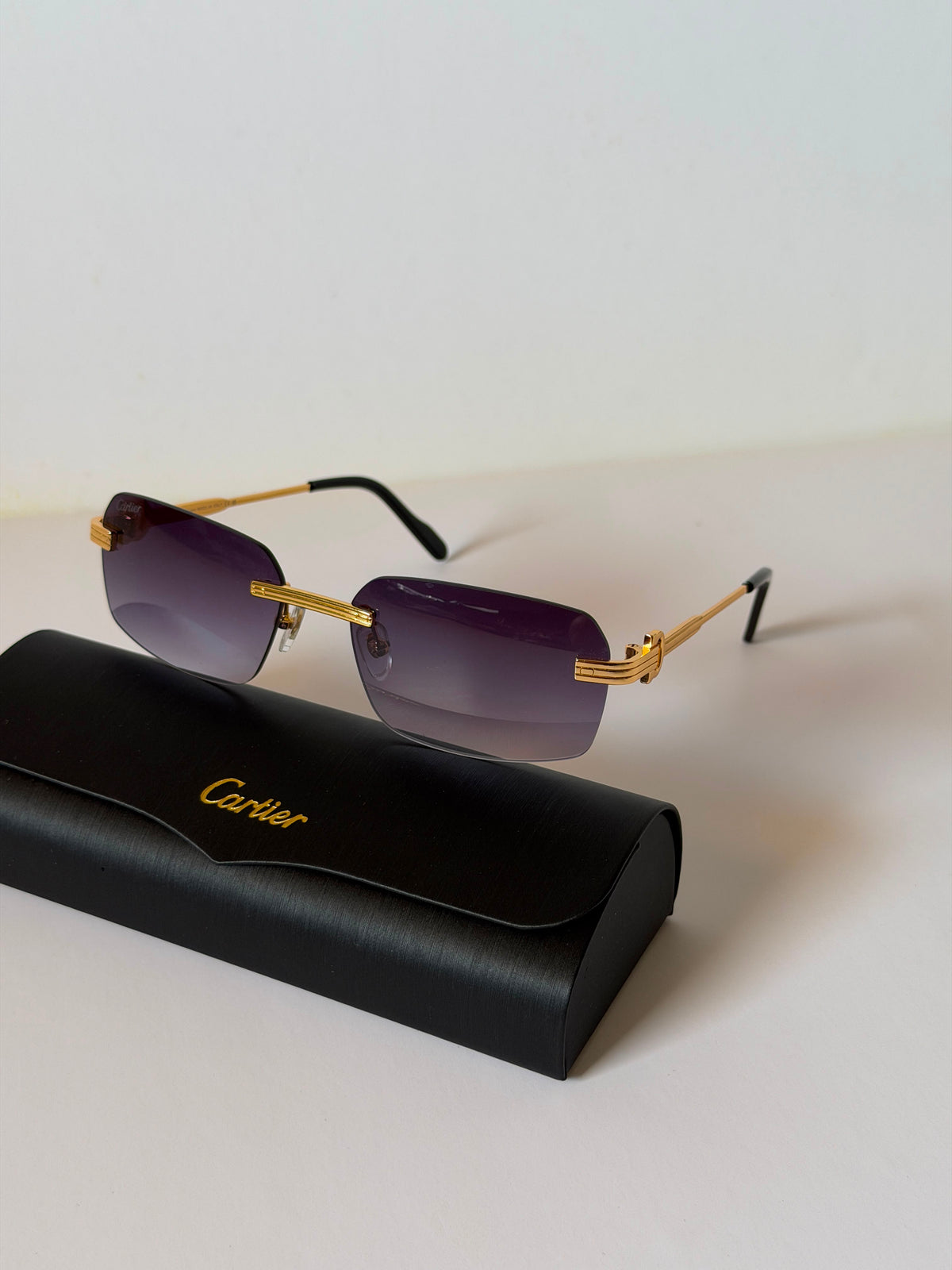 Cartier Signature C Décor Rimless Rectangle Sunglasses unisex