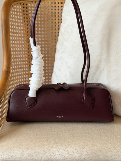 ALAÏA le teckel shoulder bag 31 CM