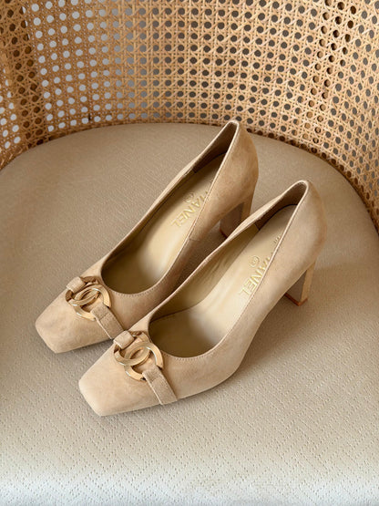 Chanel pumps featuring a chunky
