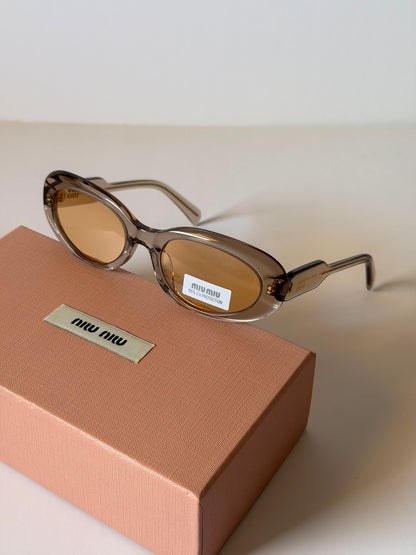 MIU MIU oval sunglasses