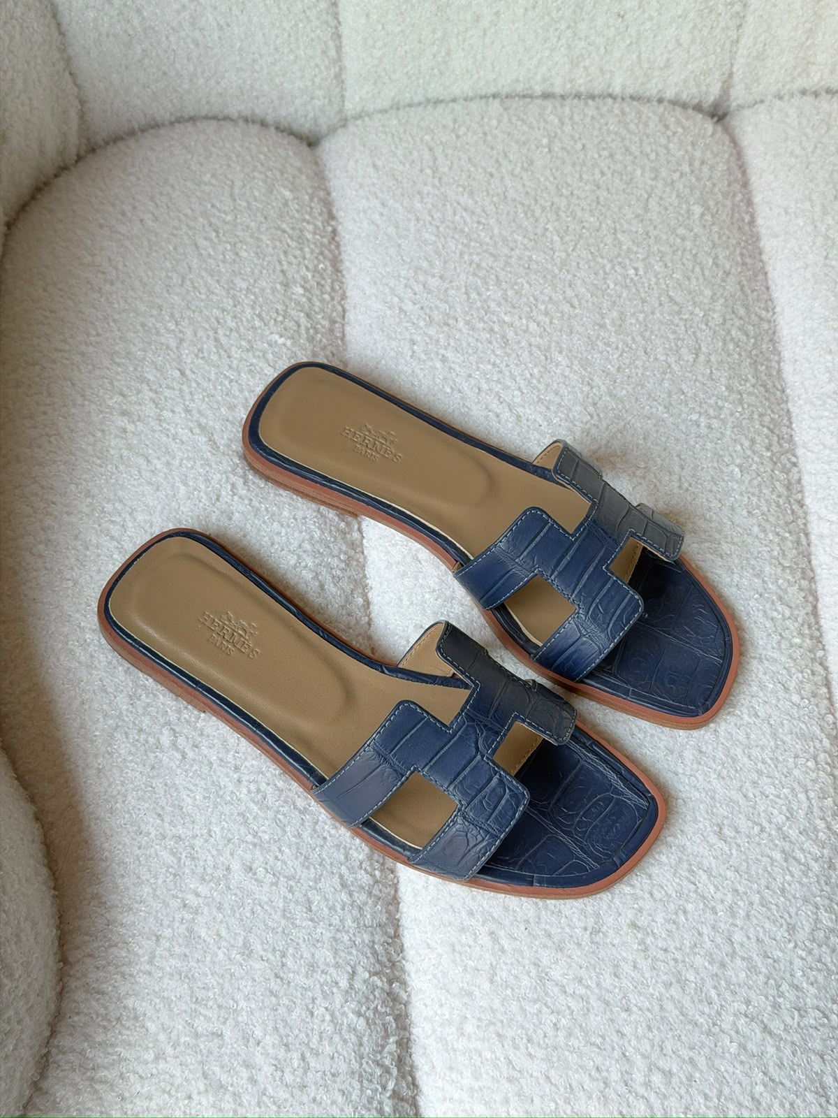 Hermès Oran sandals in crocodile-embossed leather