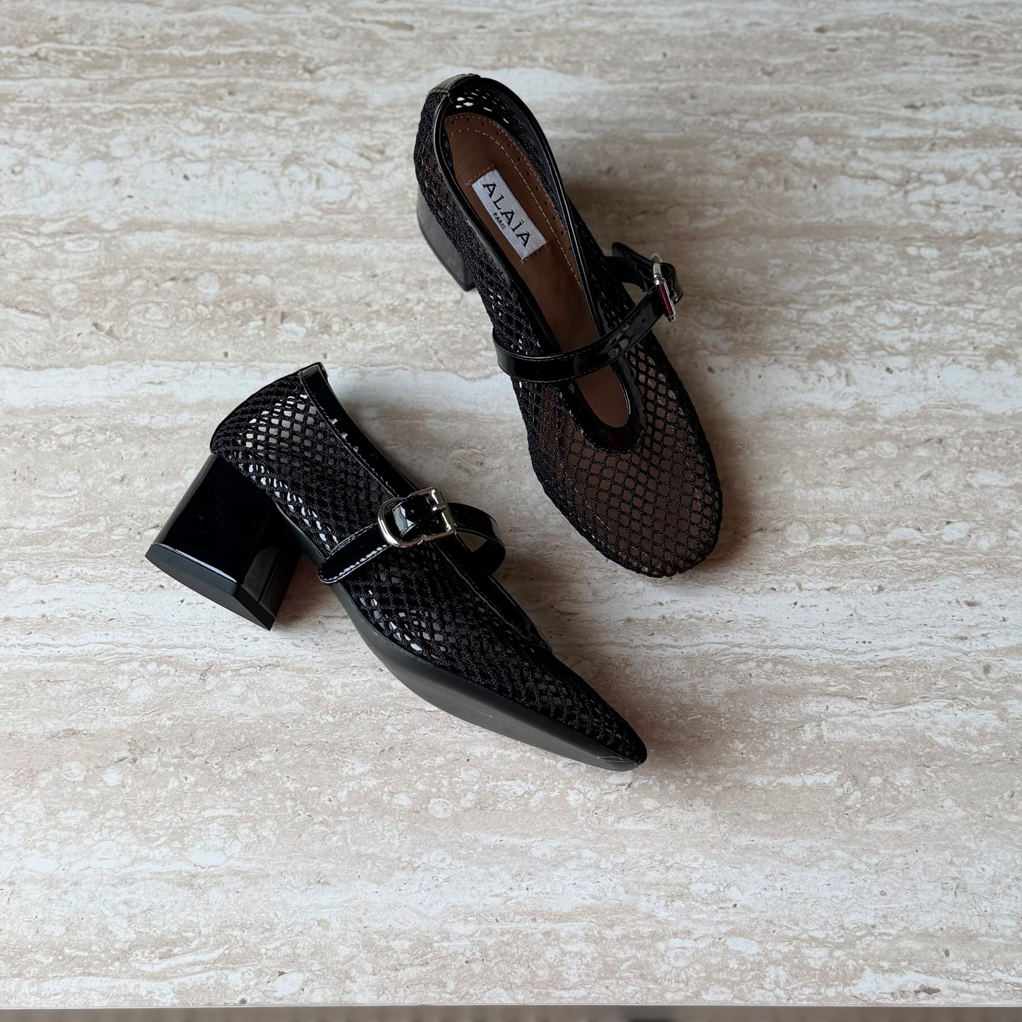 Alaïa Fishnet mesh and leather pumps