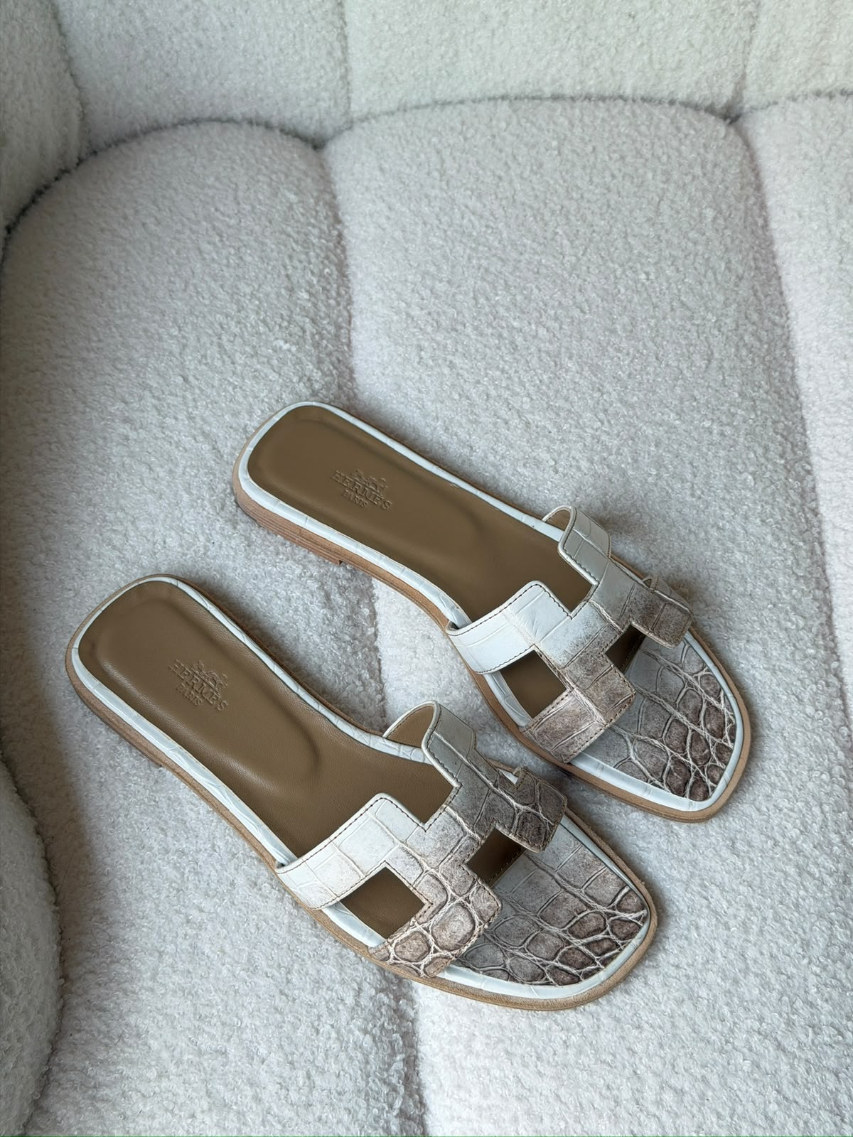 Hermès Oran sandals in crocodile-embossed leather
