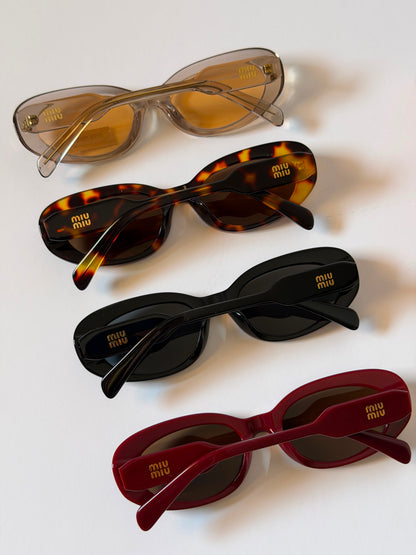 MIU MIU oval sunglasses