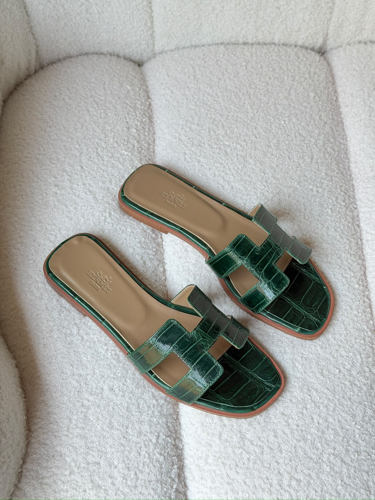 Hermès Oran sandals in crocodile-embossed leather