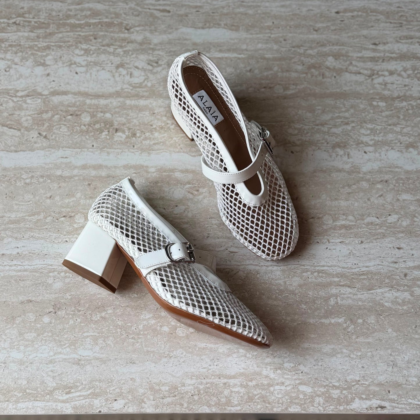 Alaïa Fishnet mesh and leather pumps