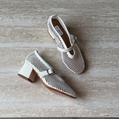 Alaïa Fishnet mesh and leather pumps