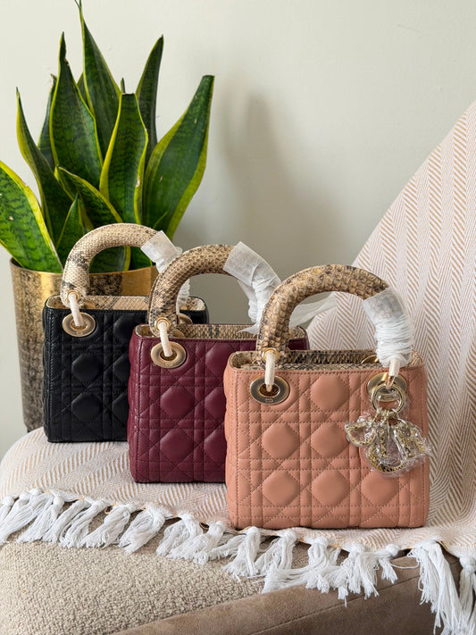 lambskin bag is the iconic Christian Dior Lady Dior 17 CM