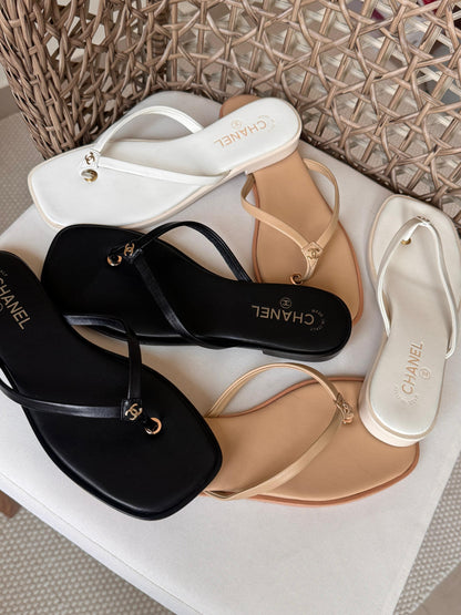 Chanel thong sandals featuring