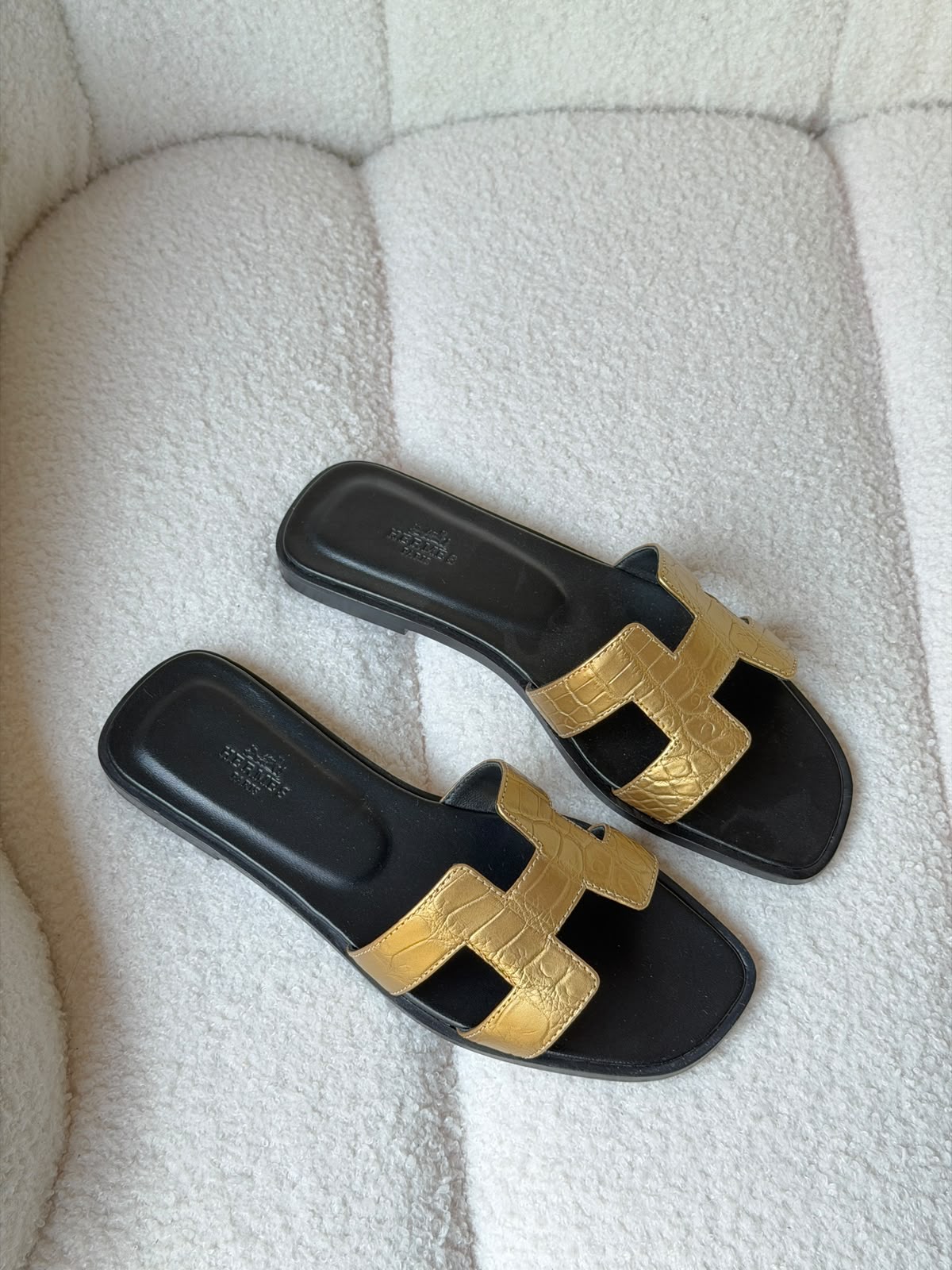 Hermès Oran sandals in crocodile-embossed leather