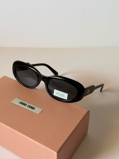 MIU MIU oval sunglasses