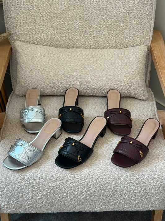 Dior Cannage heeled slides
