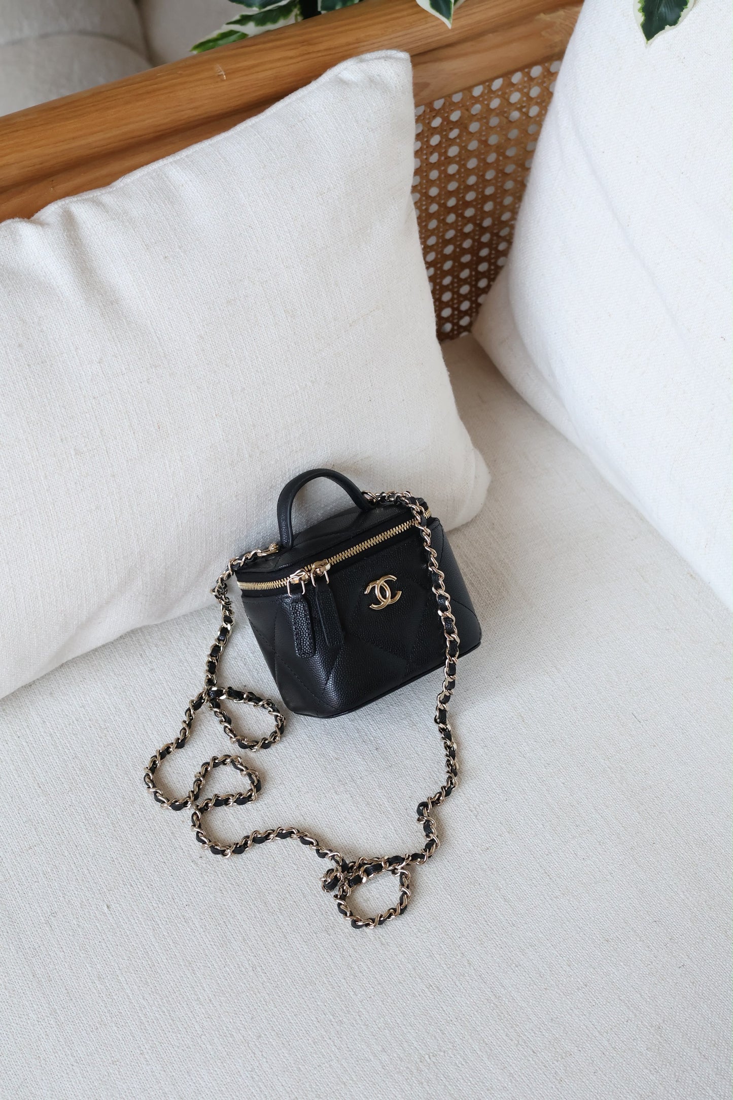 black Chanel mini vanity case
