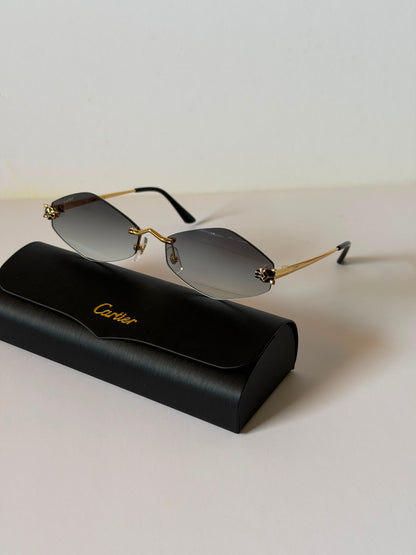 sunglasses are the Cartier Panthère de Cartier Rimless Model CT0433S