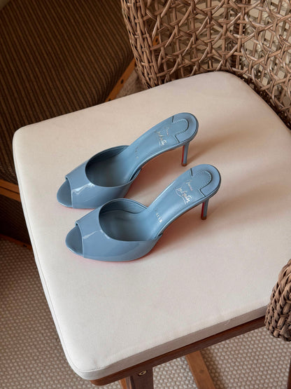 Christian Louboutin "Me Dolly" mules featuring