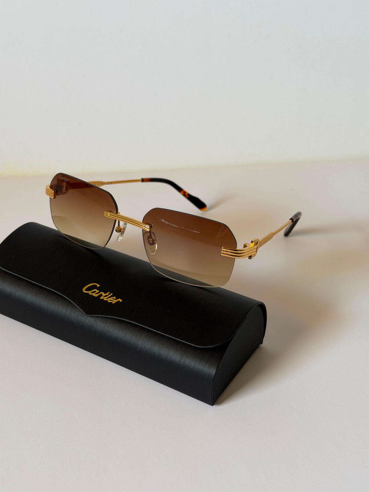 Cartier Signature C Décor Rimless Rectangle Sunglasses unisex