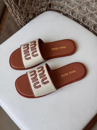 Miu Miu Embossed Logo Canvas Slide Sandals – Premium Summer Flat Sliders